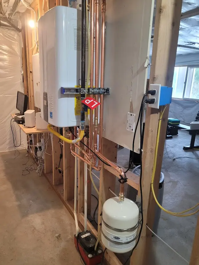 Licensed plumber repairing a kitchen sink in Phoenix